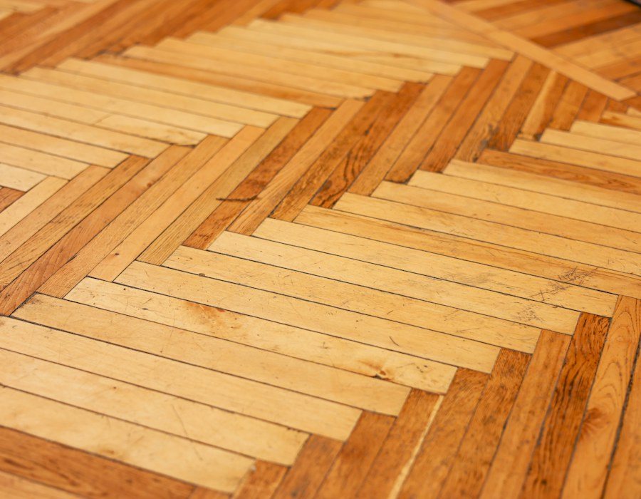 Close view of warm wood parquet flooring