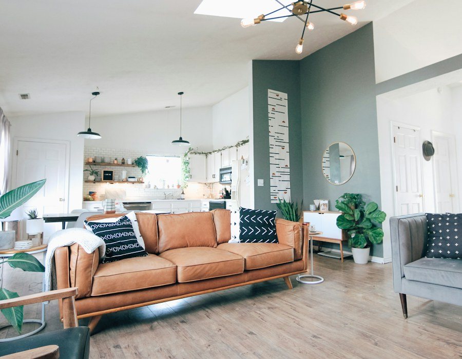 Warm modern living room with layered decor and natural textures